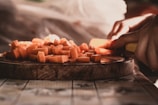 A close-up of hands preparing vegetables for a delicious meal.