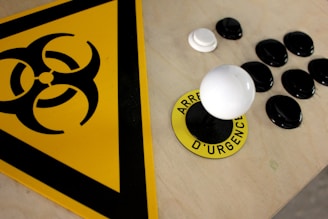 white round plastic on yellow and black textile