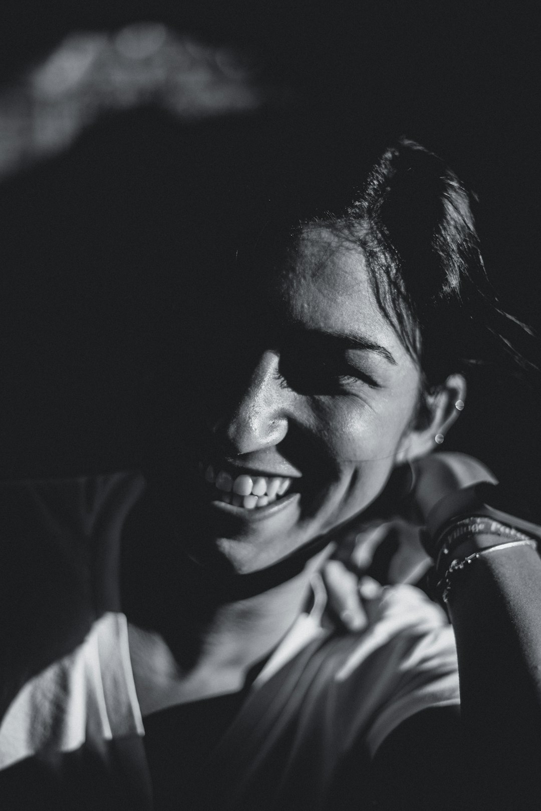 grayscale photo of smiling woman