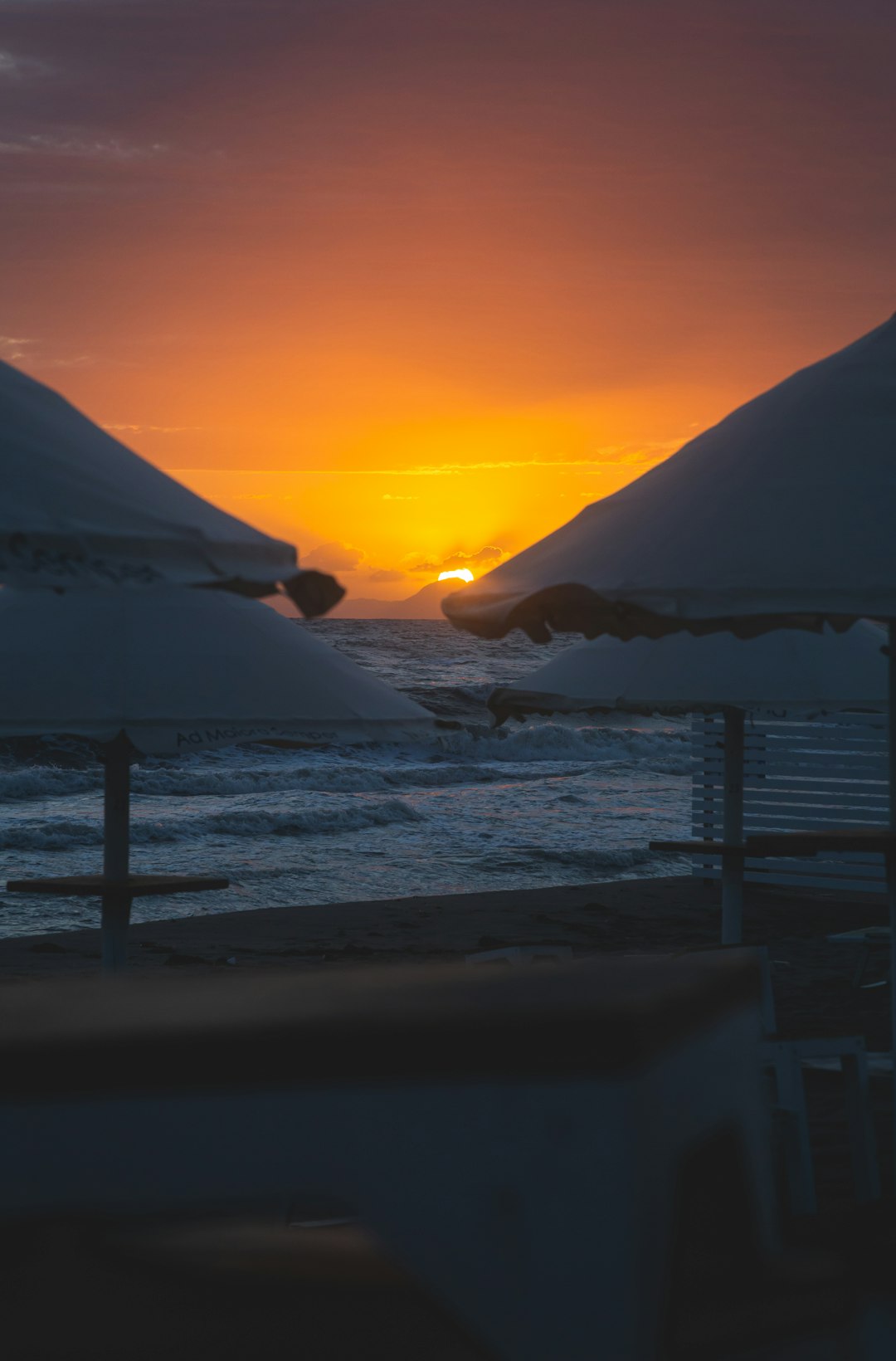 snow covered mountain during sunset