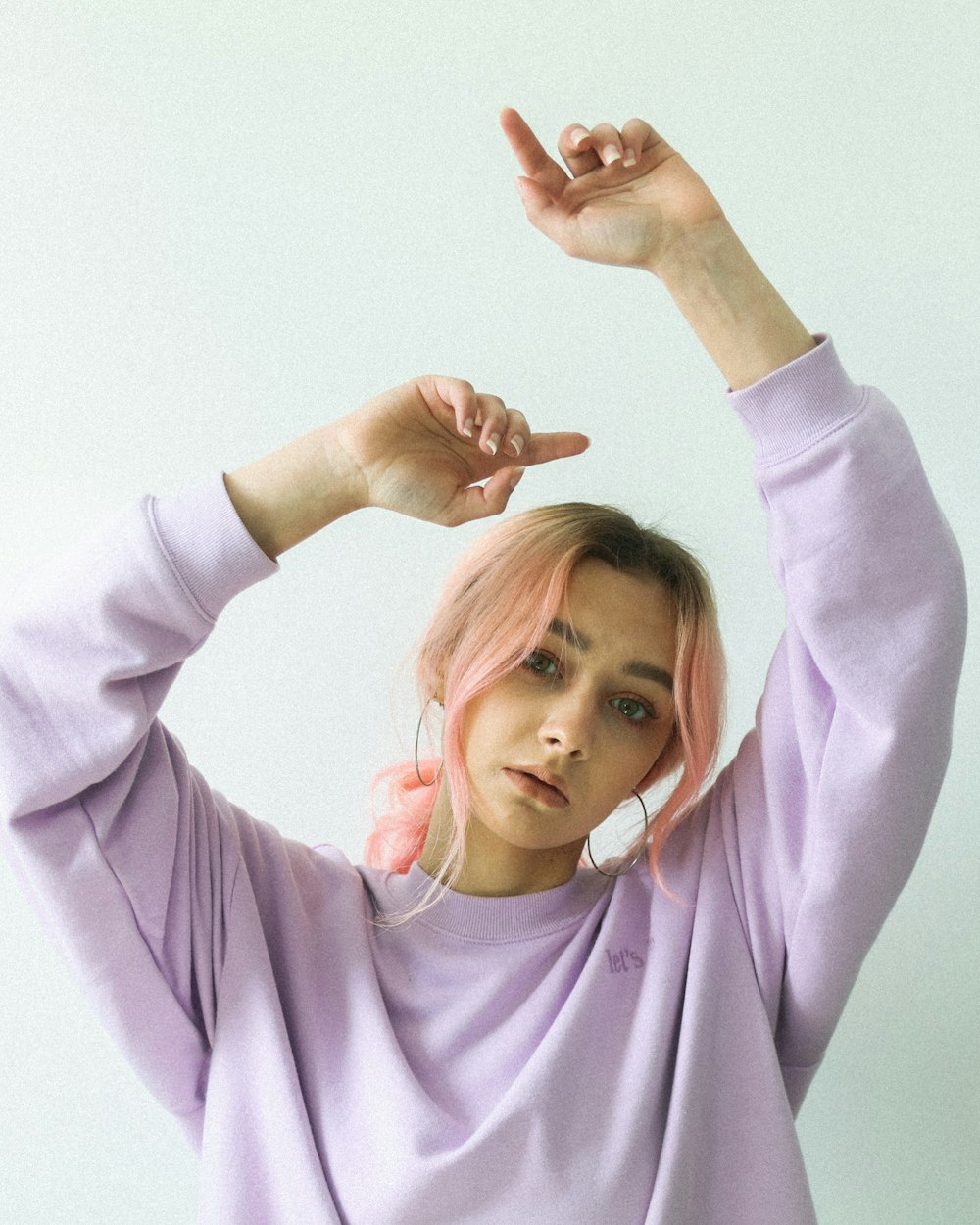 girl in purple long sleeve shirt