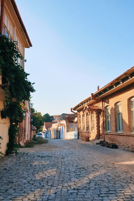 brown concrete building under blue sky during daytime in Sighnaghi Georgia