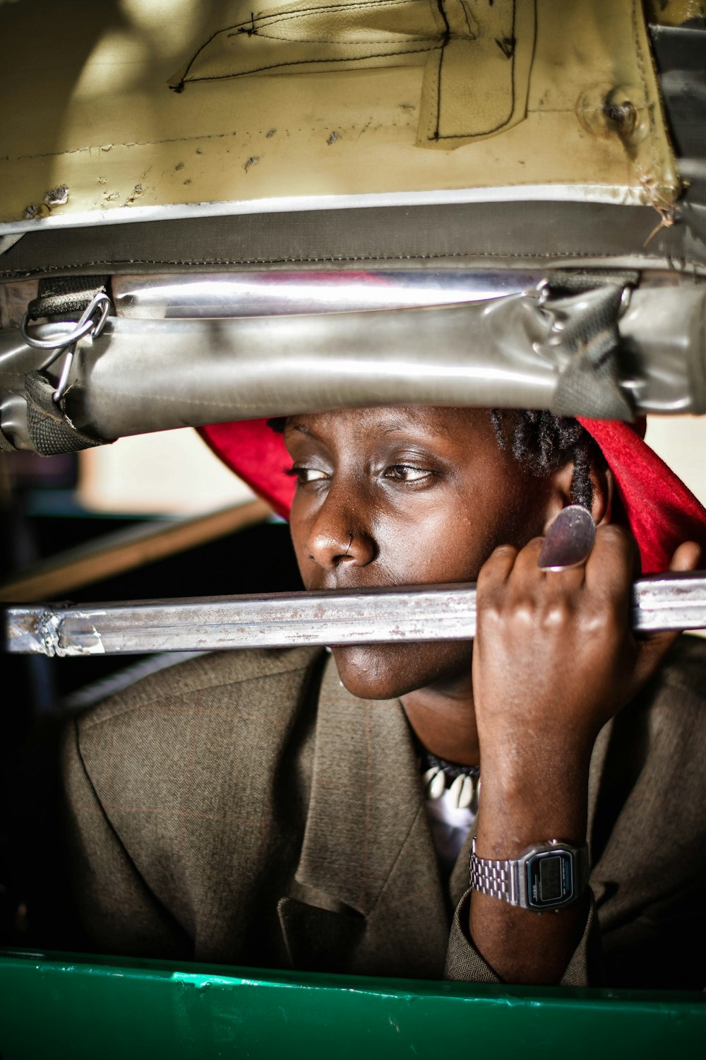 person holding silver steel bar