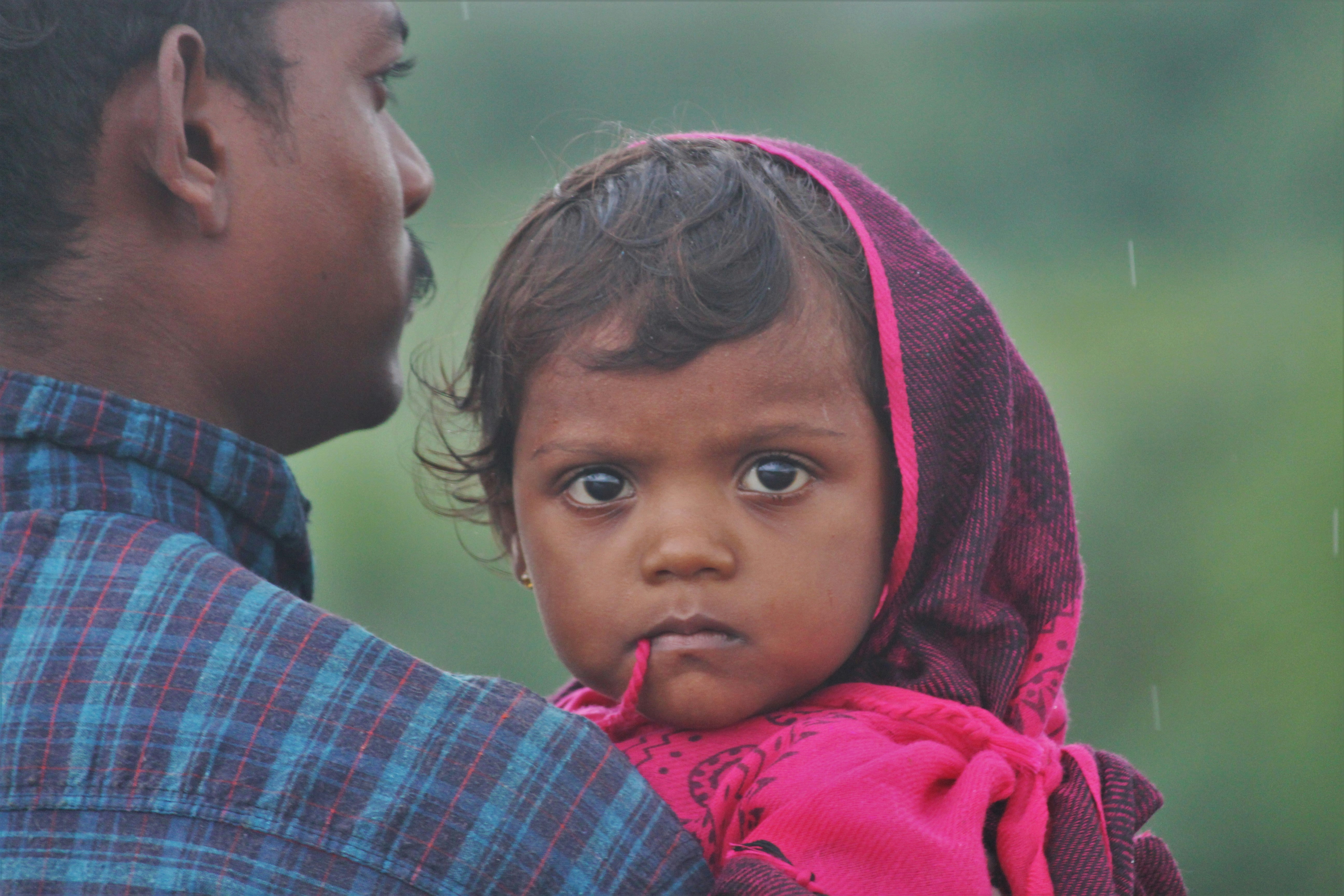 boy in red and blue plaid shirt
