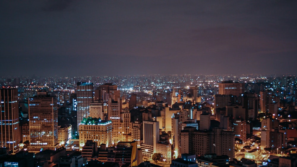 aerial view of city buildings during night time