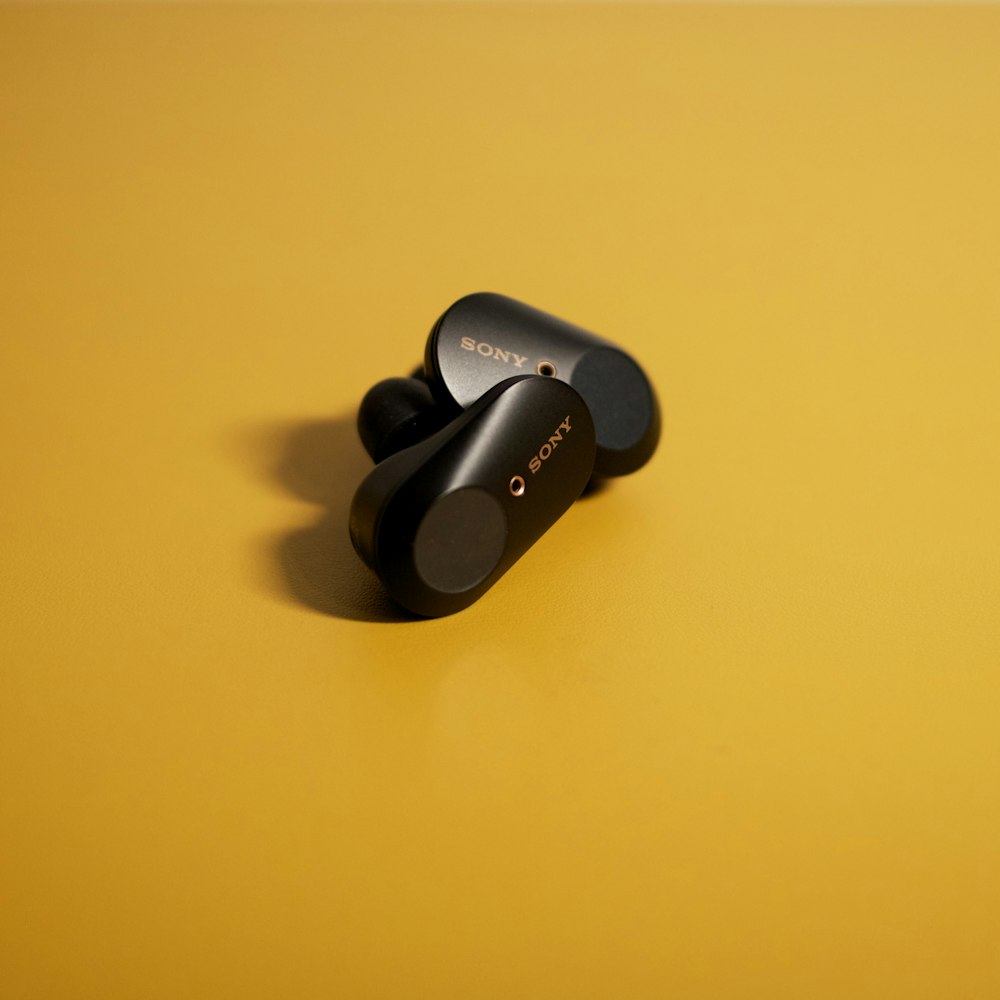 black and gray wireless headphones