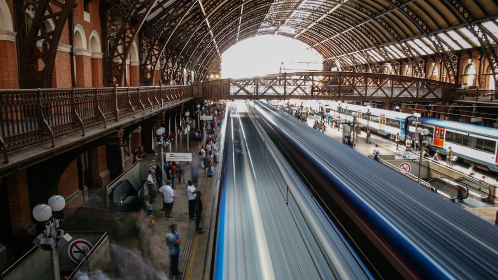 people walking on train station