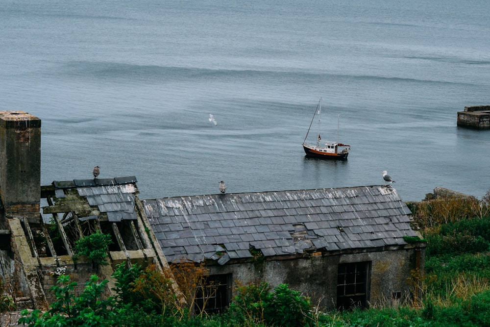 brown boat on body of water during daytime