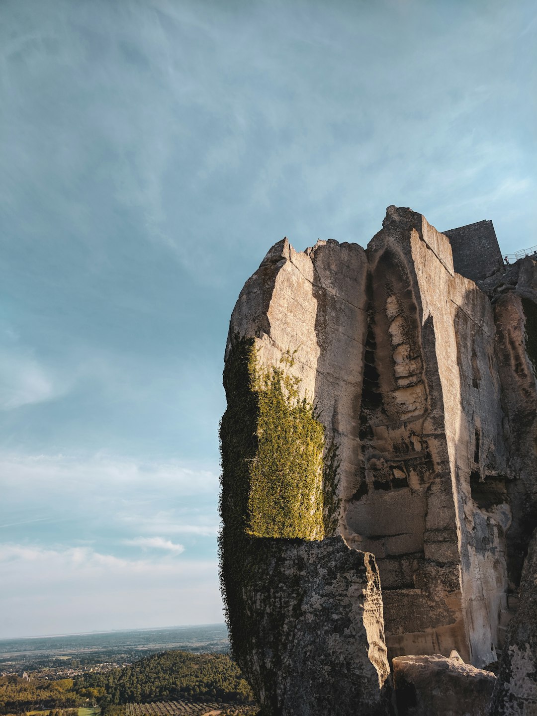 brown rock formation under blue sky during daytime