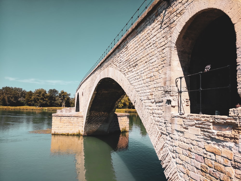 brown brick bridge over river