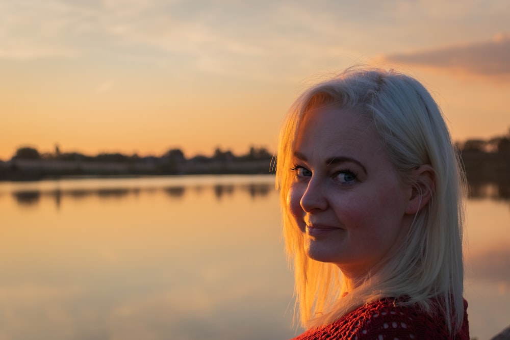 woman in red and white floral shirt