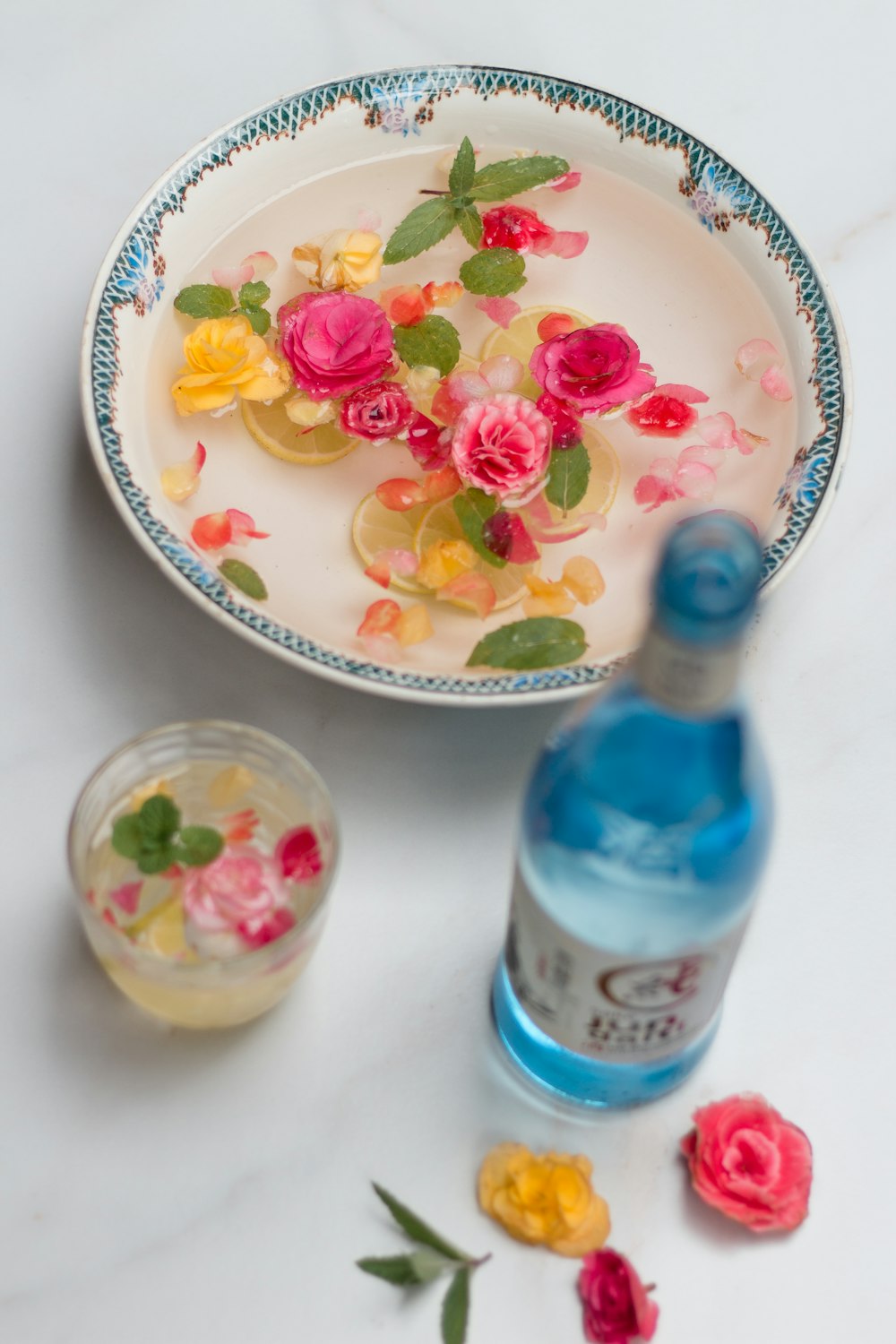 white and pink floral ceramic plate