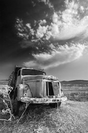 grayscale photo of vintage car