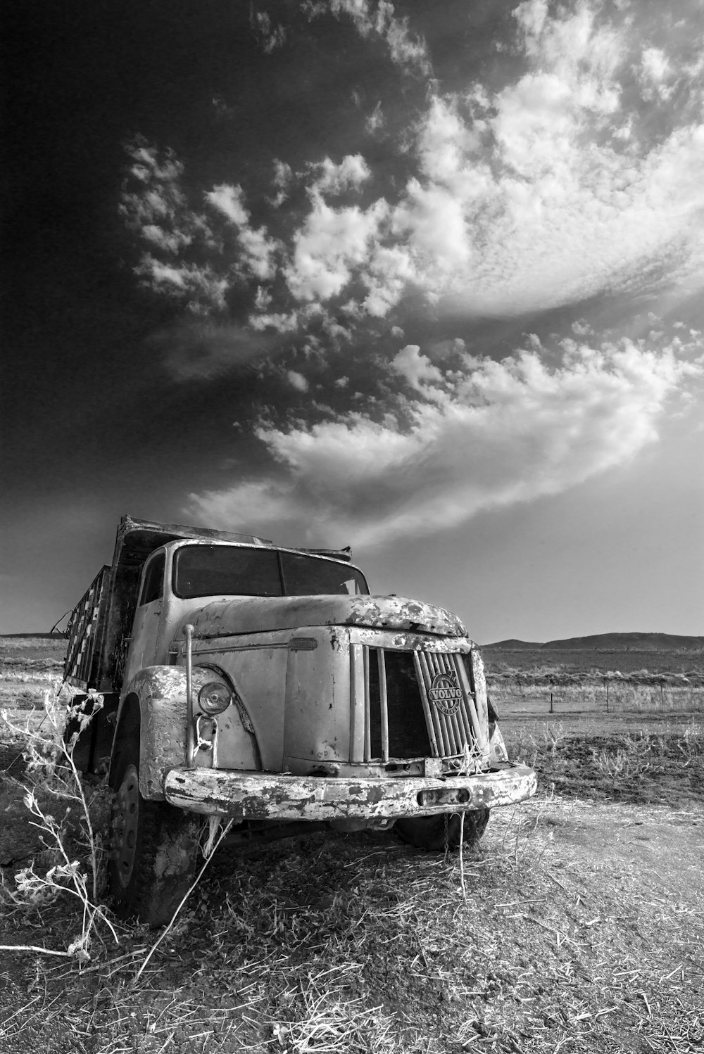 grayscale photo of vintage car