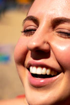 Illustration of a happy woman with glowing skin, highlighting gut and skin health connection.