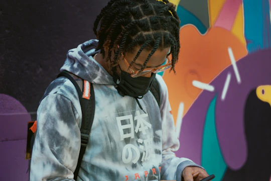 man in white and black jacket