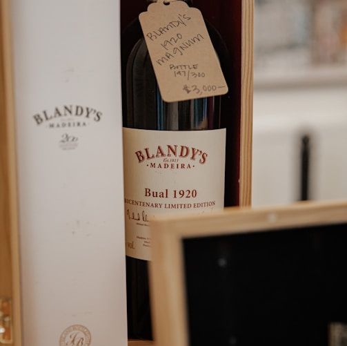 a bottle of wine sitting on top of a table