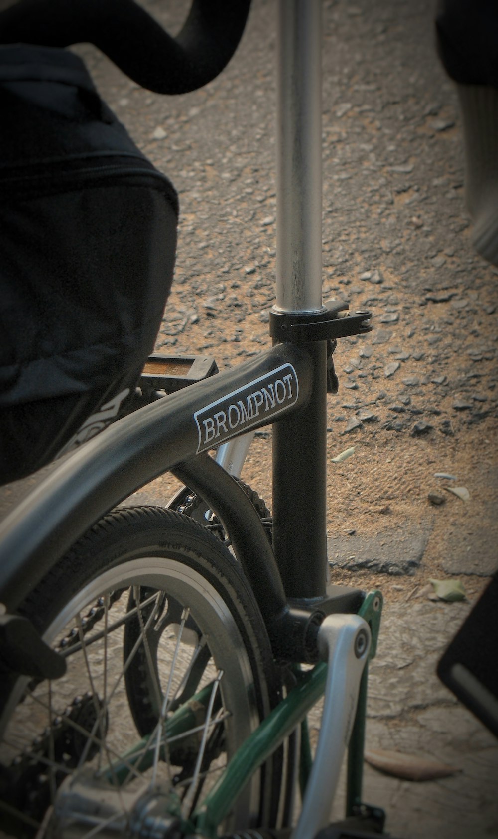 black and gray bicycle on brown sand during daytime