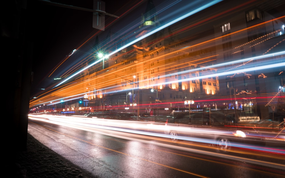 time lapse photography of cars on road during night time