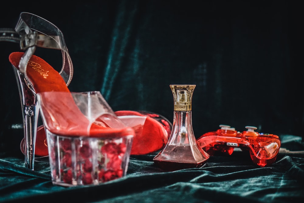 clear glass pitcher on table