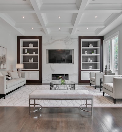 white wooden coffee table near white sofa