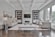 white wooden coffee table near white sofa