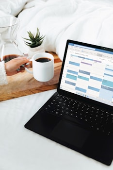 Workspace with coffee and laptop