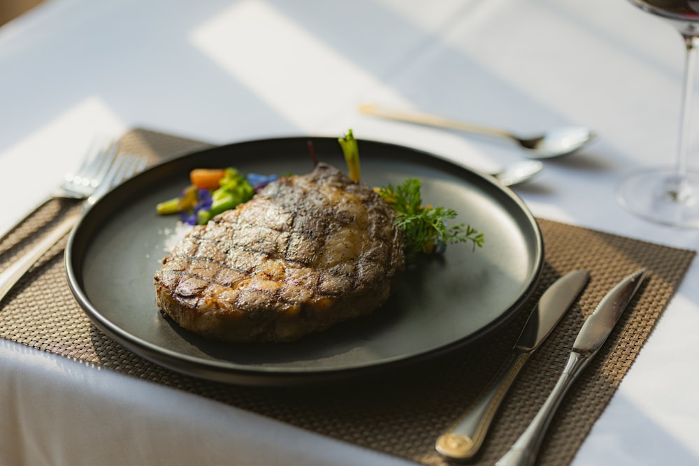 grilled meat on black plate