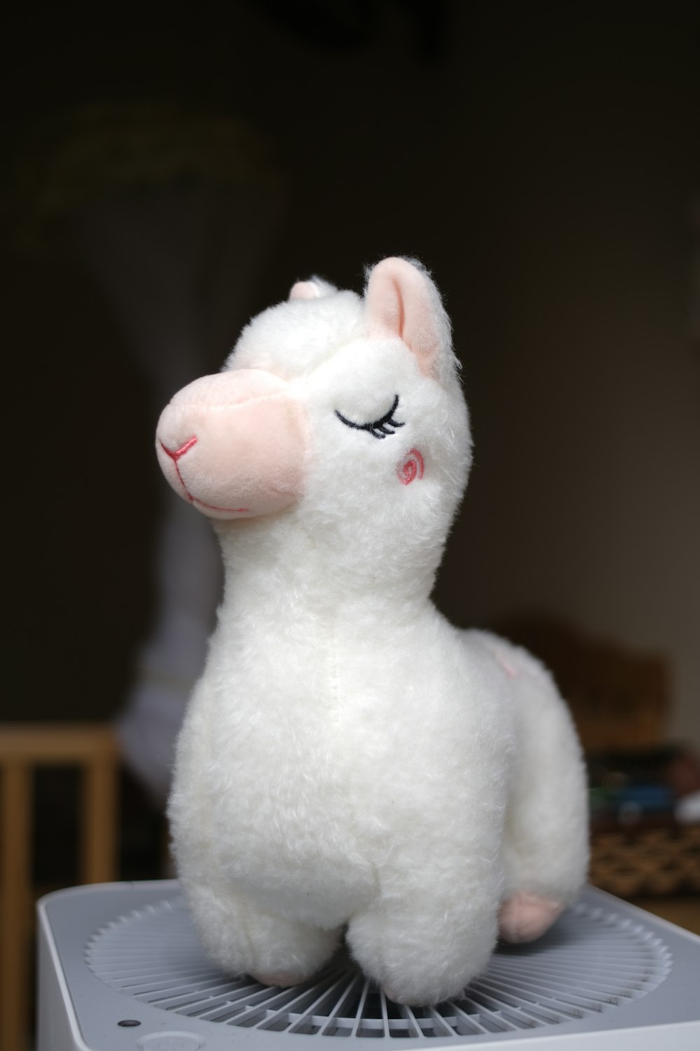 white and pink rabbit plush toy