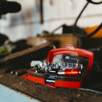 red and black plastic toy car