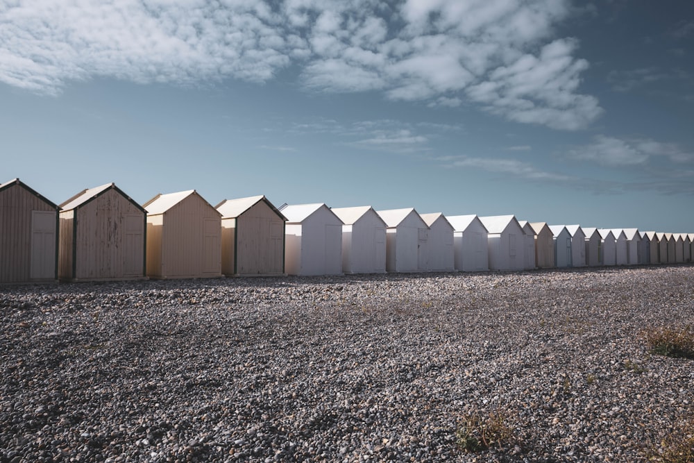 white and brown wooden houses under blue sky during daytime