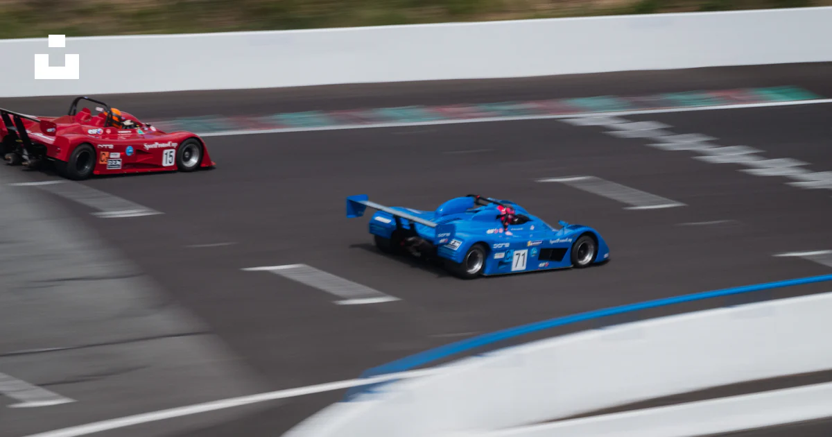 Red and blue racing car on track photo – Free Circuit de charade Image ...