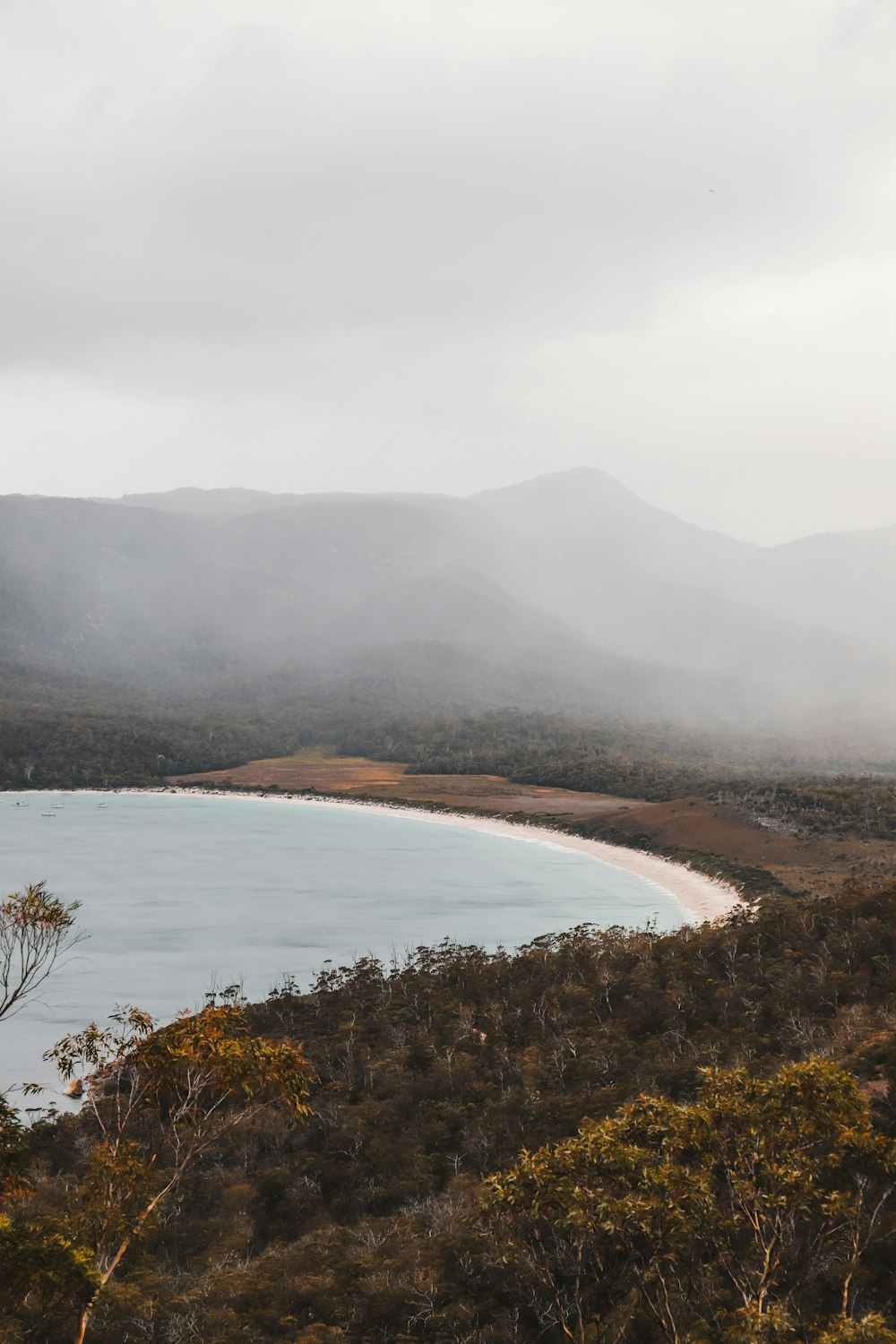 lake in the middle of mountains