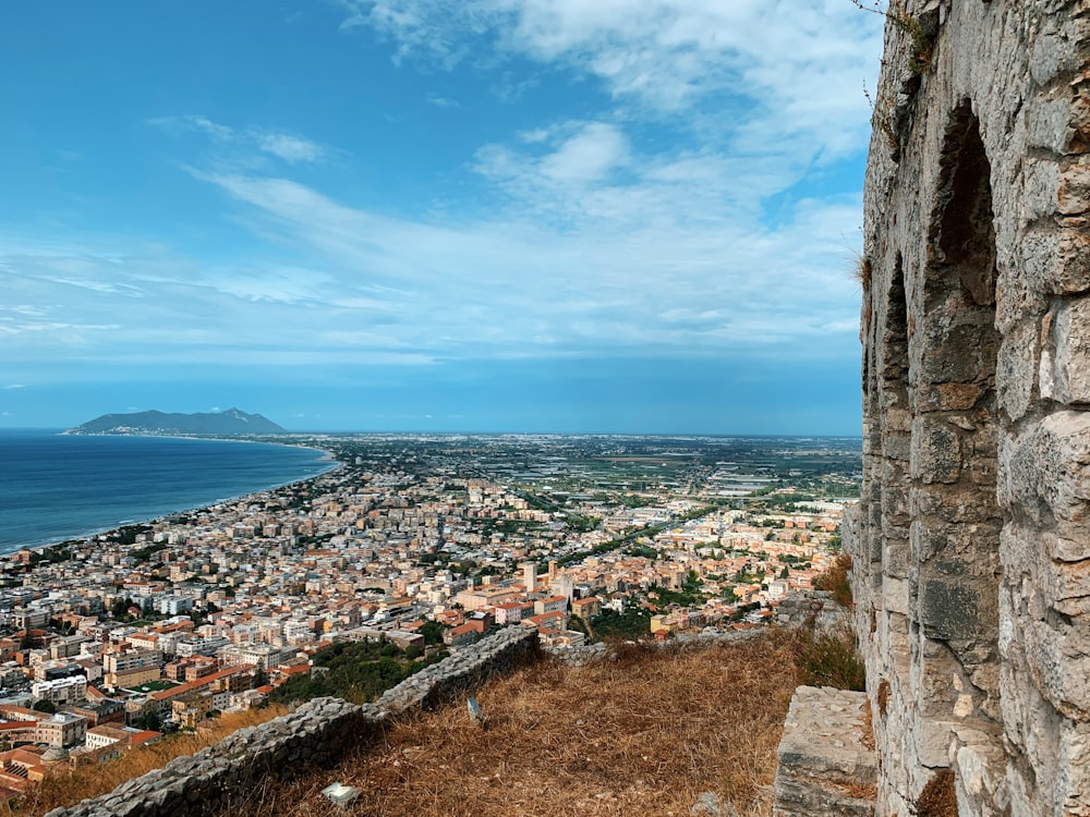 aerial view of city near sea during daytime