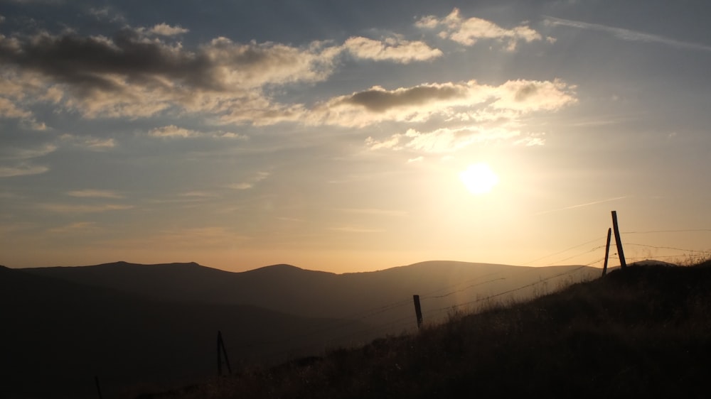 silhouette of mountain during sunset