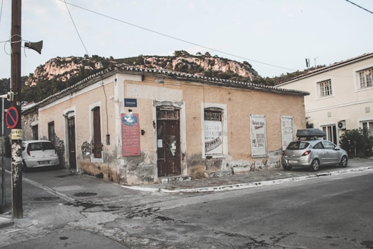 white and brown concrete building during daytime in Limni Greece