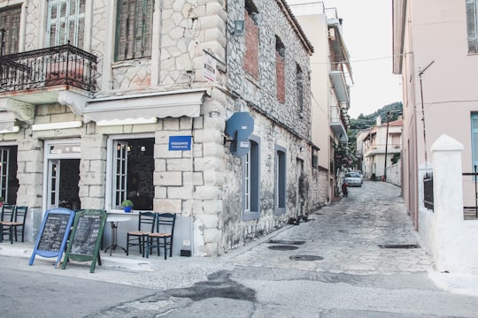 blue and brown concrete building during daytime in Limni Greece