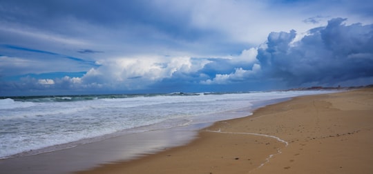 sea waves crashing on shore under blue and white cloudy sky during daytime in Capbreton France