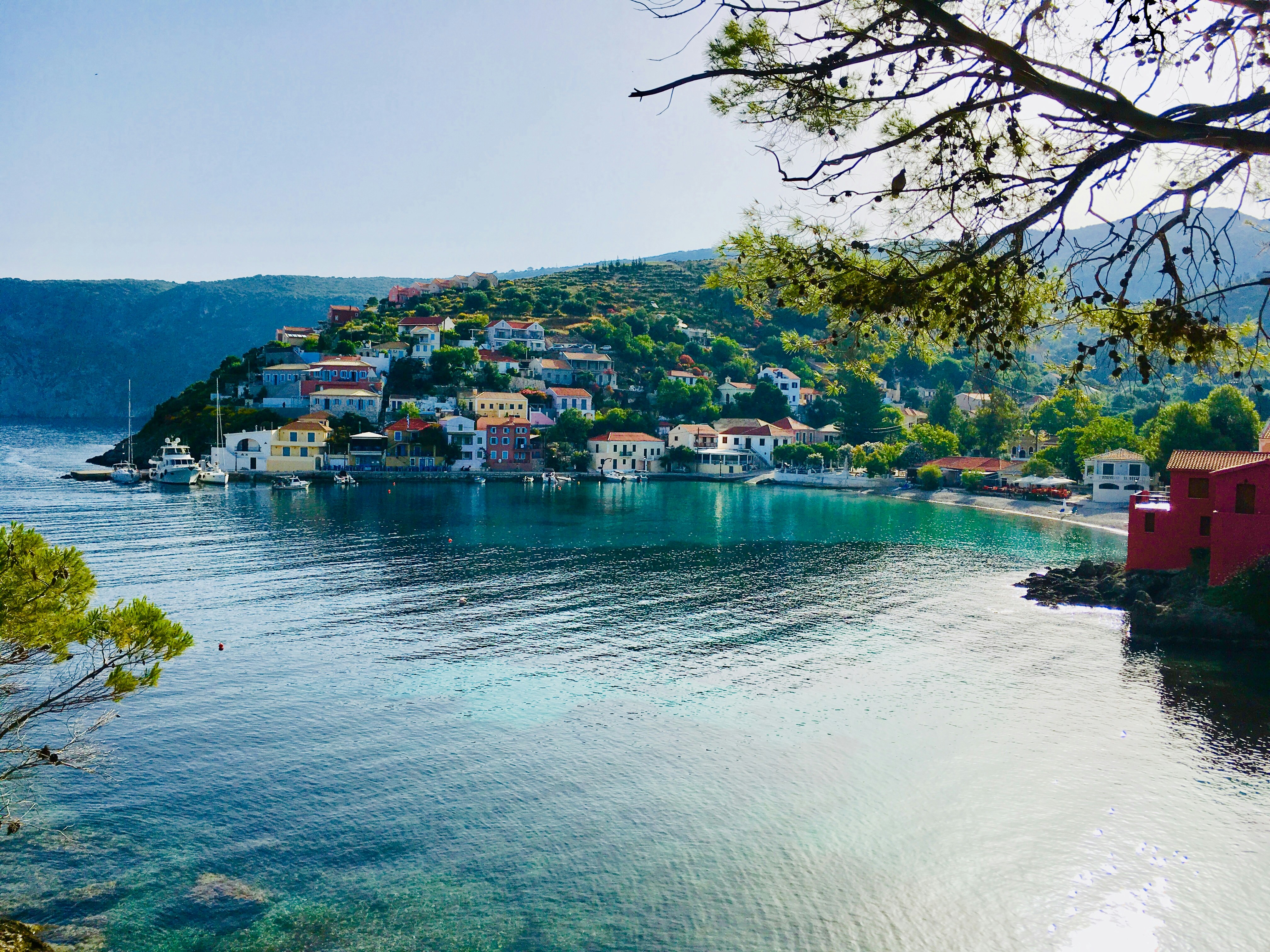 A serene seaside view in Greece. The country’s favorable climate and affordable lifestyle (around 35% lower cost of living than the U.S. on average) make it attractive for early retirees.