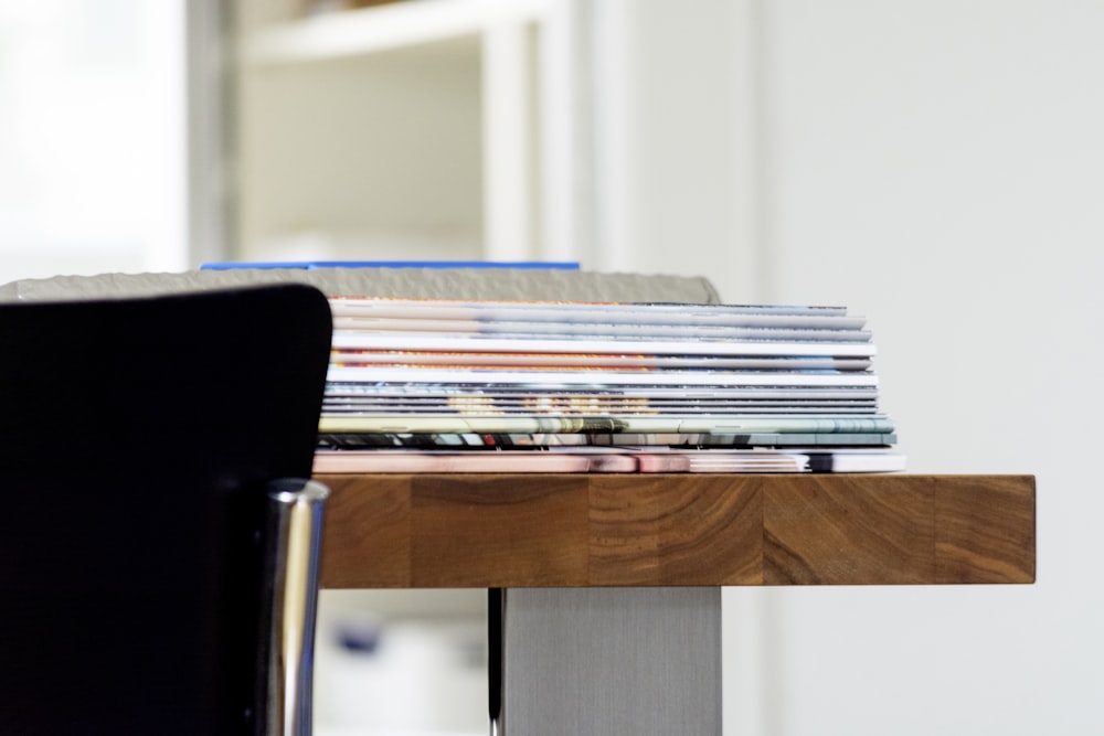 books on brown wooden table