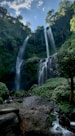 waterfalls on rocky ground during daytime