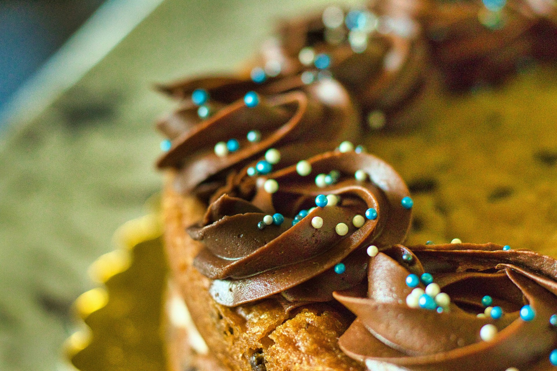 brown cookies with red and blue beads