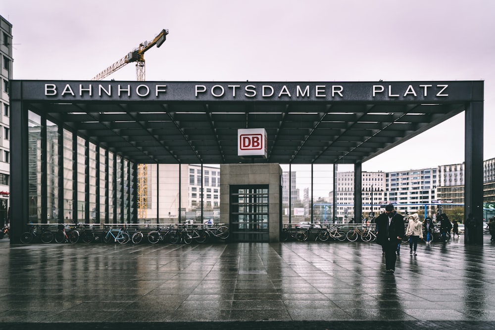 people walking on gray concrete floor during daytime