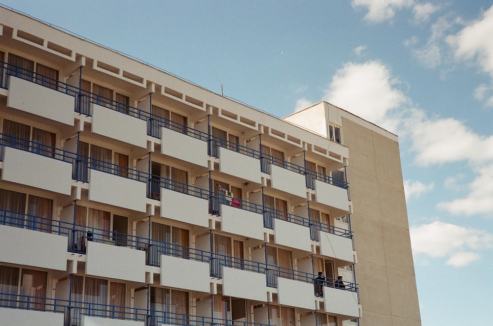 beige concrete building under blue sky during daytime