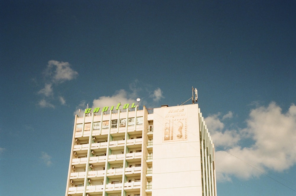 white concrete building under blue sky during daytime