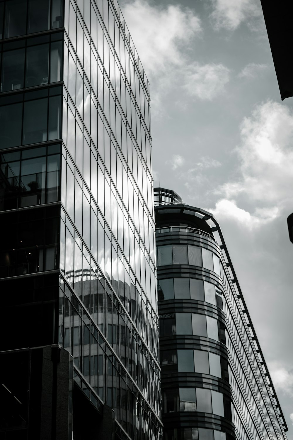 gray concrete building under cloudy sky during daytime