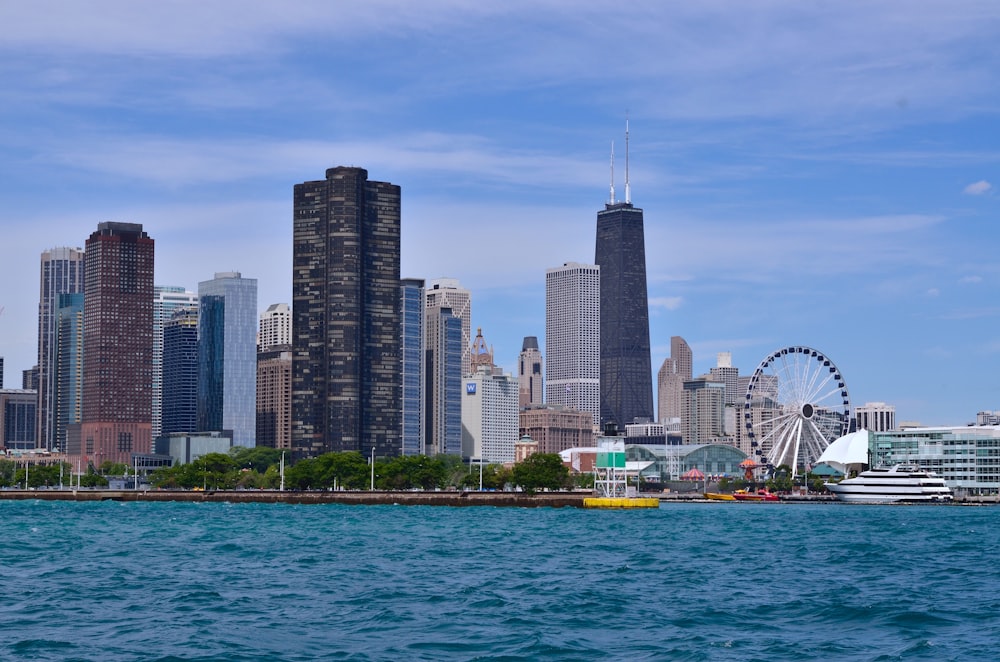 high rise buildings near body of water during daytime