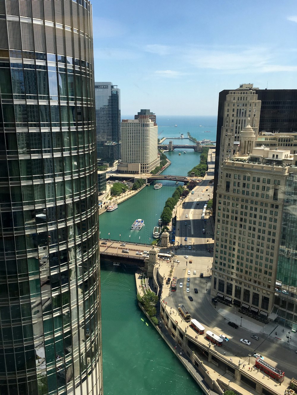 high rise buildings near river during daytime