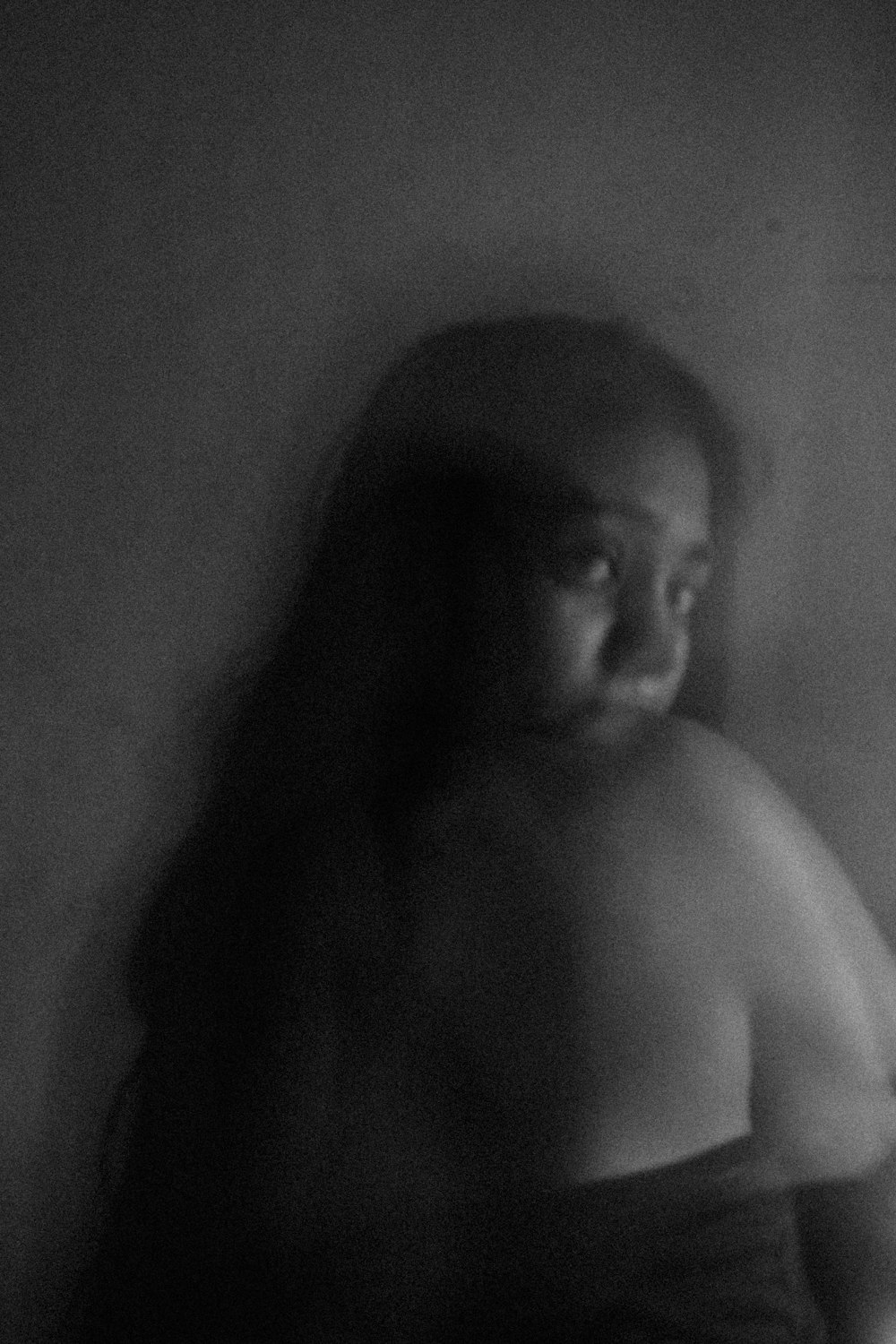 topless woman in grayscale photography