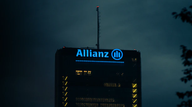 A modern Allianz office building with the company logo prominently displayed.